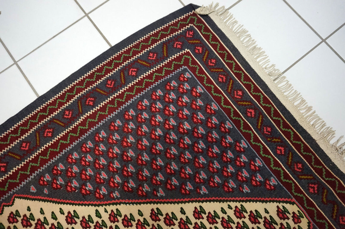 Detailed view of handwoven wool rug from the Middle East