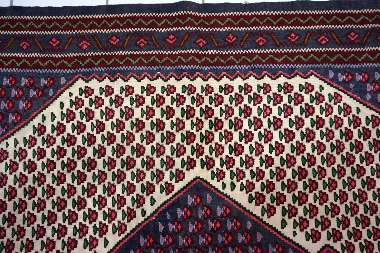 Zoomed-in image of the large medallion in the center of the kilim