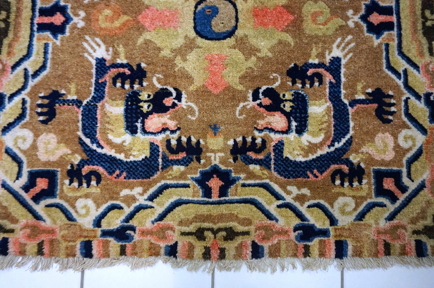 Handcrafted wool rug from China with intricate design