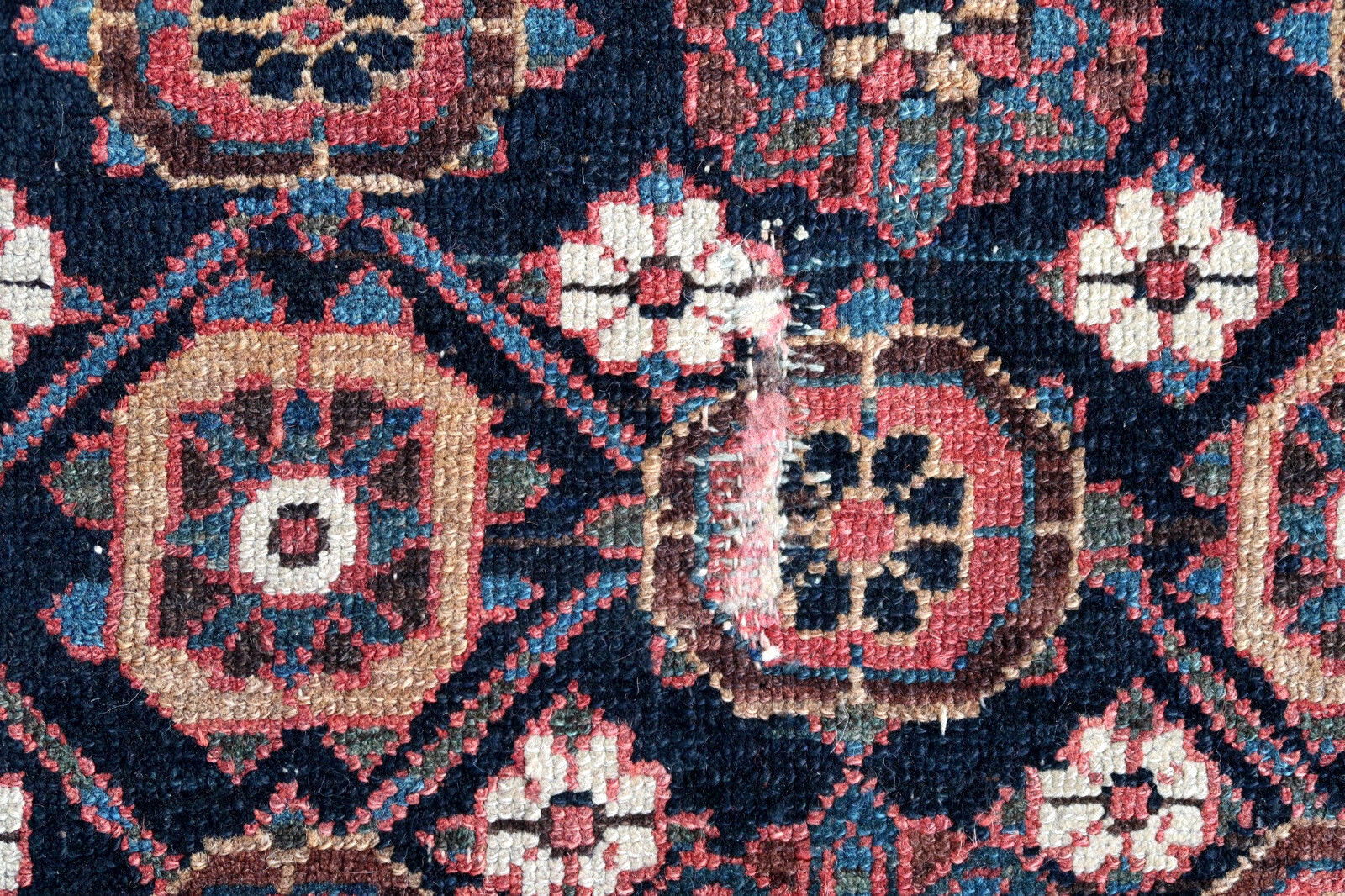 Handmade antique Persian Hamadan rug in all-over design. The rug is from the beginning of 230th century in original condition, it has some signs of age.