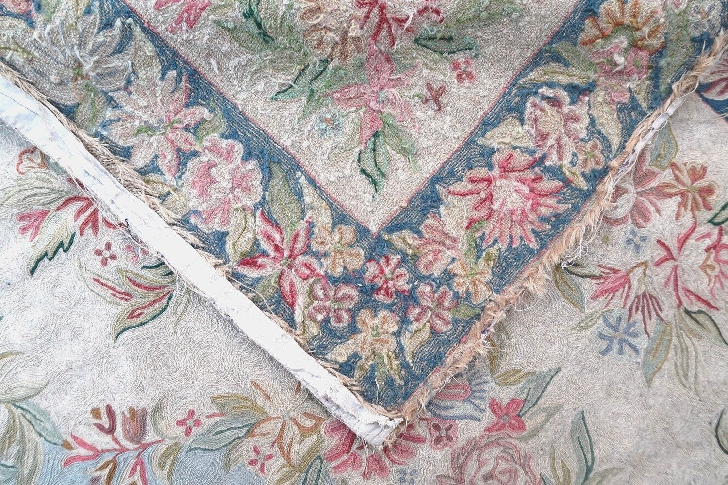 Handmade vintage Indian Embroidery rug in French Aubusson design. The rug is from the middle of 20th century in original condition, it has some signs of age.