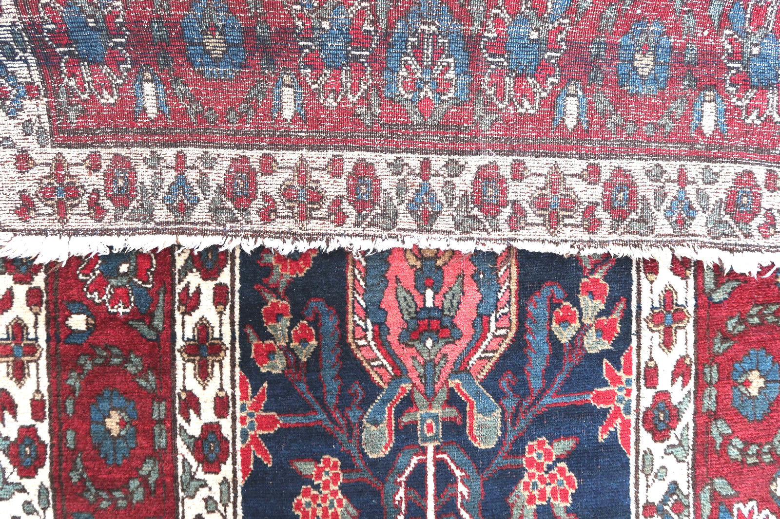 Handmade antique runner from North West in floral design and vegetable dyes. The rug is from the beginning of 20th century in original good condition.