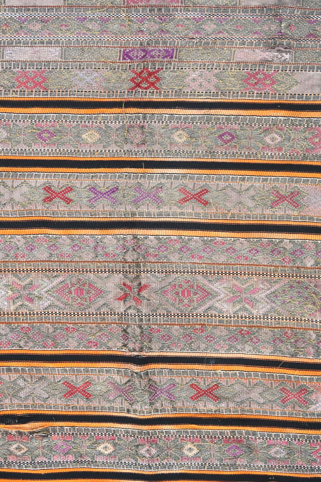 Handmade antique fragment from a wedding veil, Djerba (Tunisia). This piece is from the end of 19th century in original condition, it has some holes and wears. This kilim is collectible. It is made in cotton, silk and metal strings.
