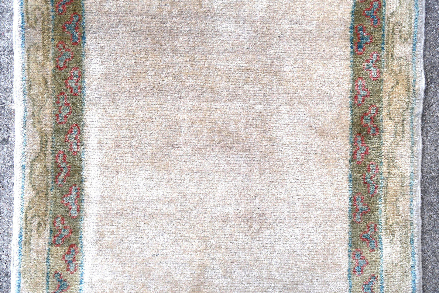 Handmade vintage Turkish runner from Sivas region in beige color. The rug is in original good condition, from the end of 20th century.