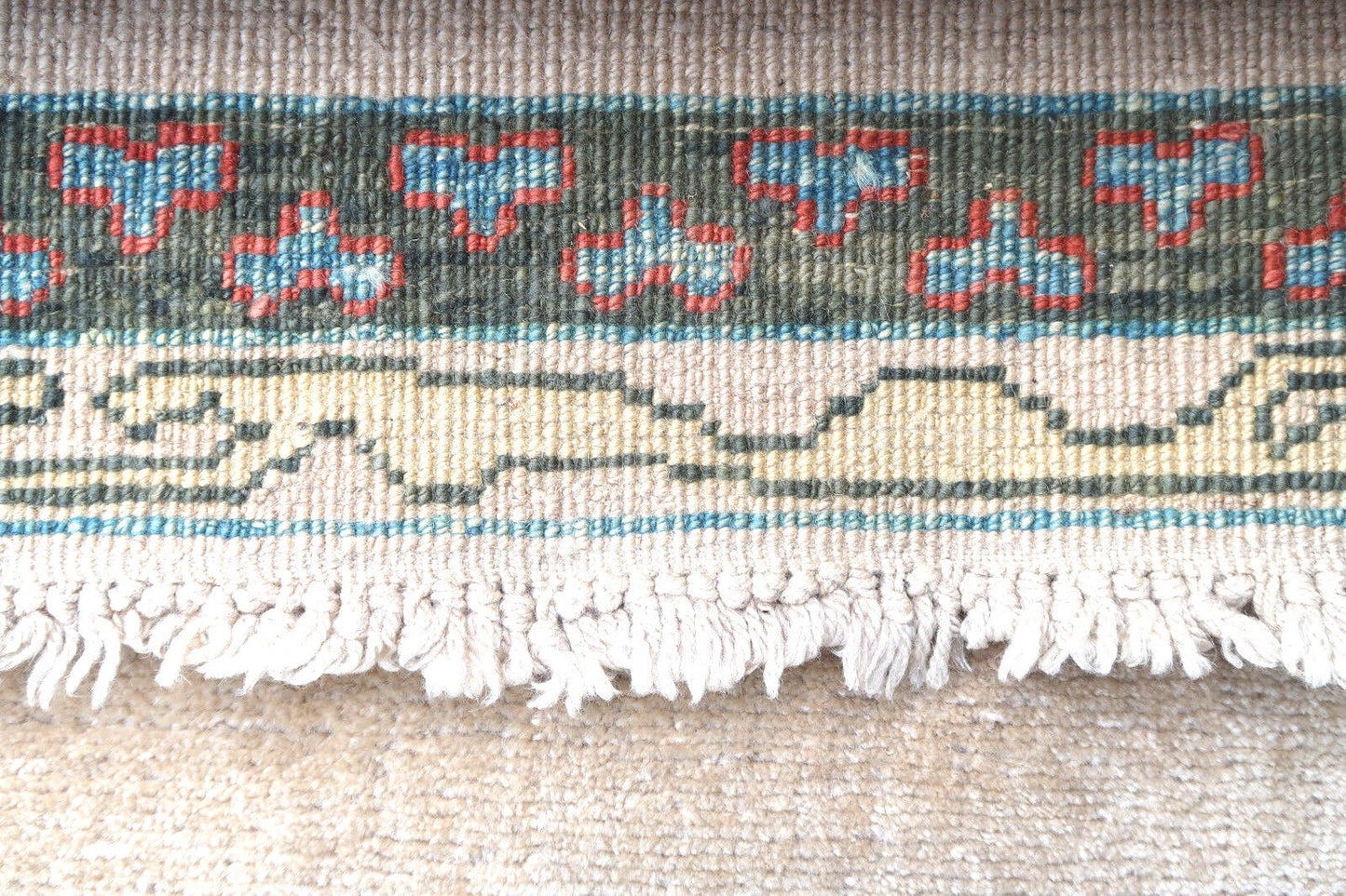 Handmade vintage Turkish runner from Sivas region in beige color. The rug is in original good condition, from the end of 20th century.