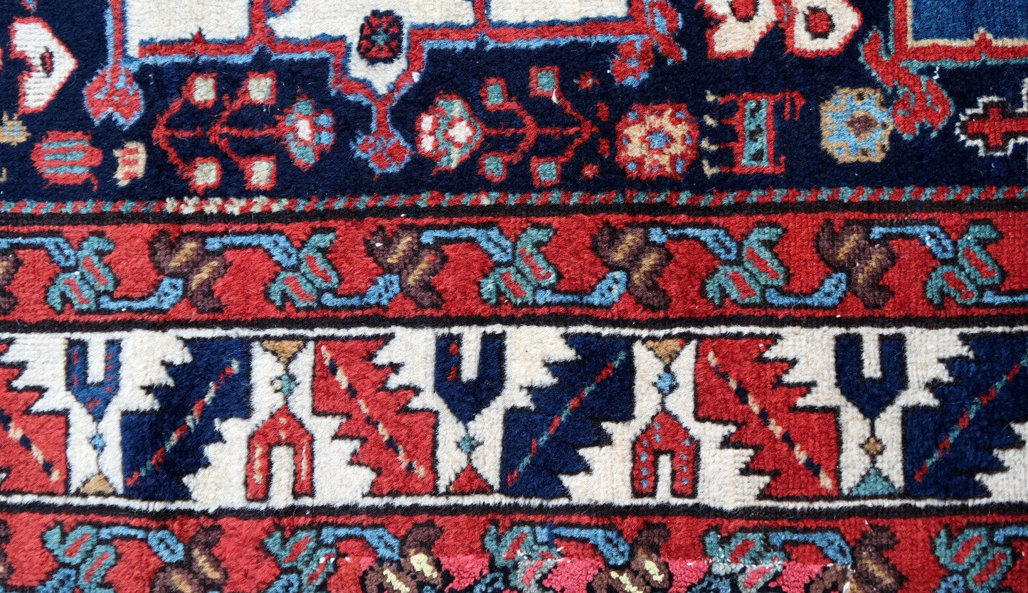 Handmade antique Persian Karajeh rug in bright colors. This collectible rug is from the middle of 19th century in original condition, it has some old restorations.