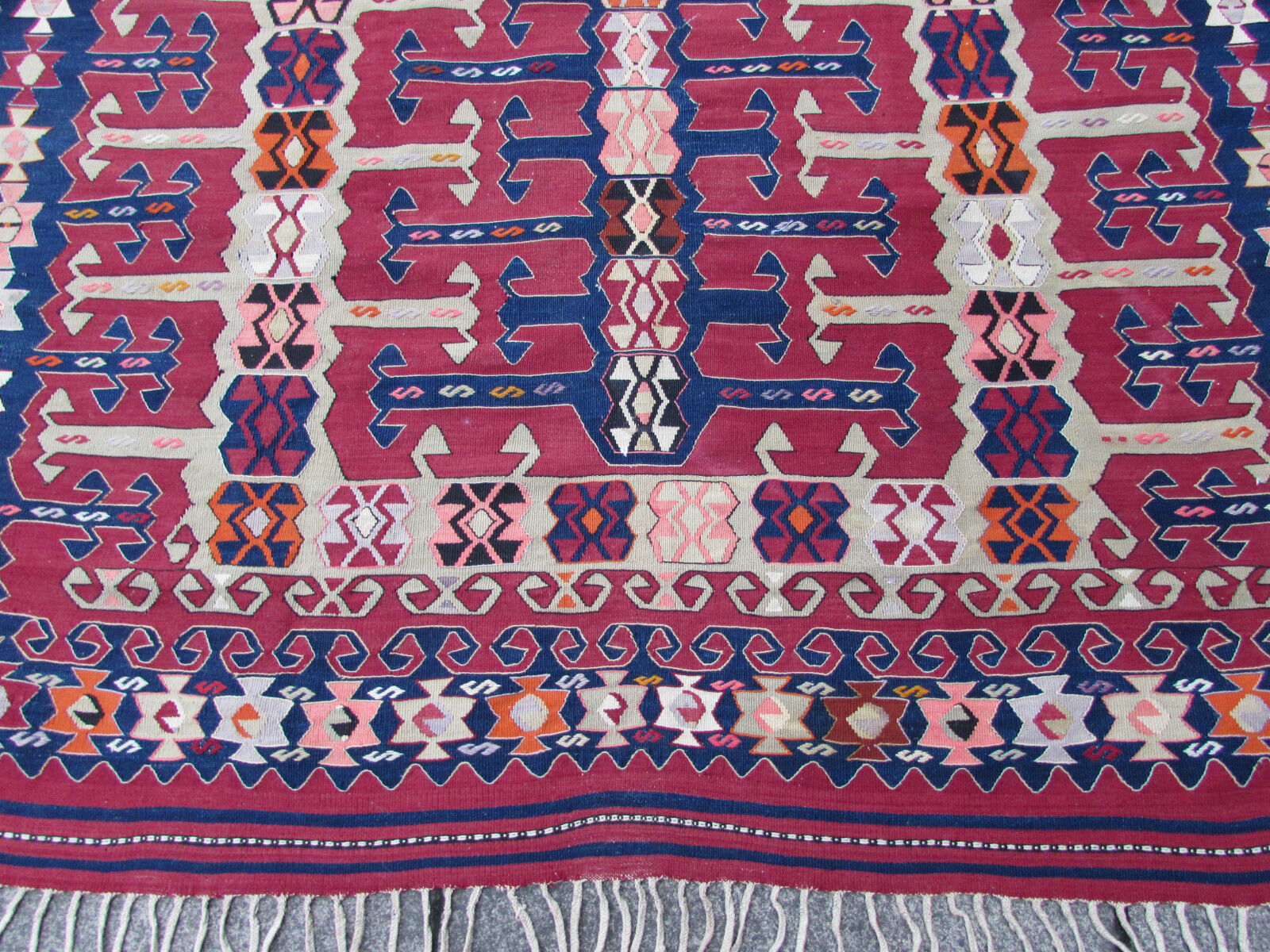 Handmade antique Turkish Anatolian kilim in natural shades and geometric design. The flatweave is from the beginning of 20th century in original good condition.