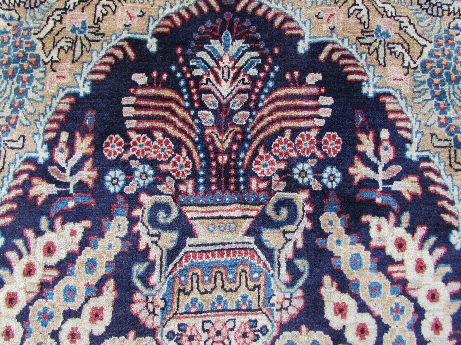 Handmade vintage Persian Kashan rug in prayer design with birds and flowers. The rug is from the end of 20th century in original good condition.
