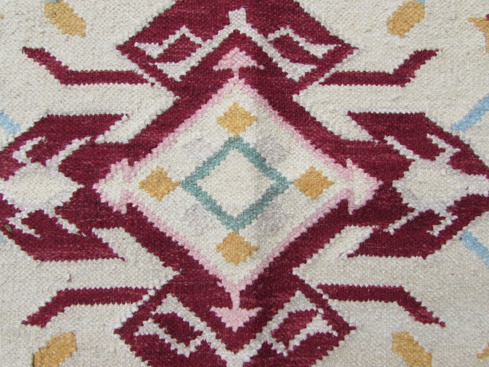 Handmade vintage Indian Dhurrie kilim in light shades. The rug is from the end of 20th century in original good condition.