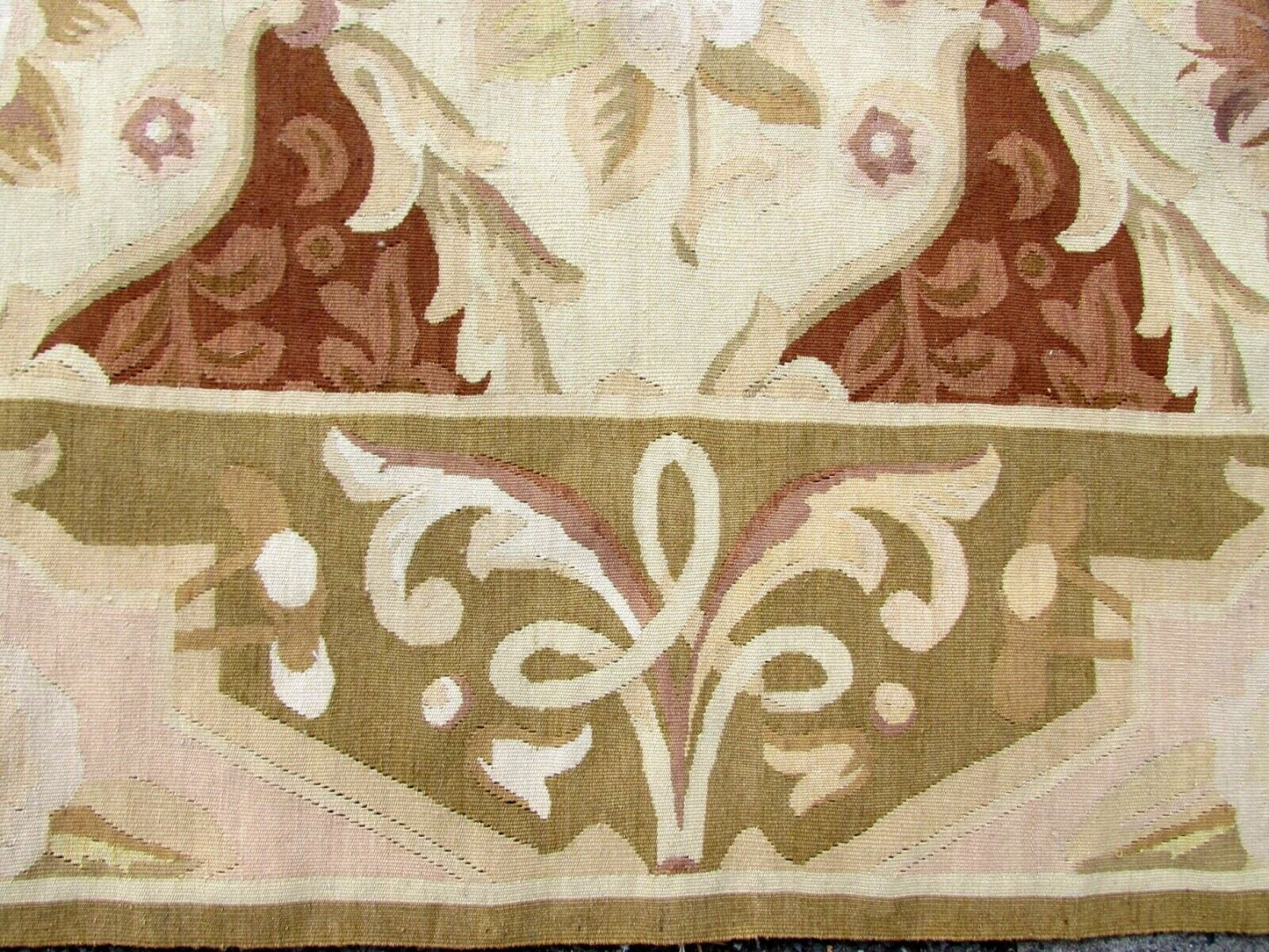 Handmade vintage French Aubusson rug in geometric design and repeating pattern. This rug has been made in the end of 20th century and in original good condition.