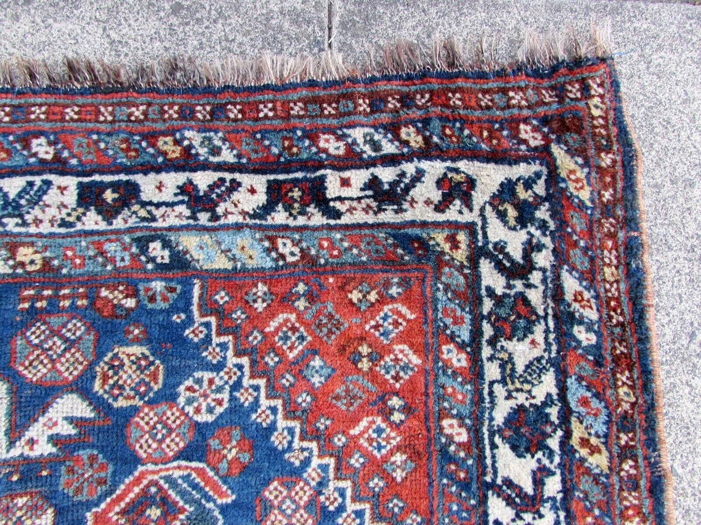 Close-up of intricate knotting technique used in traditional Persian rug