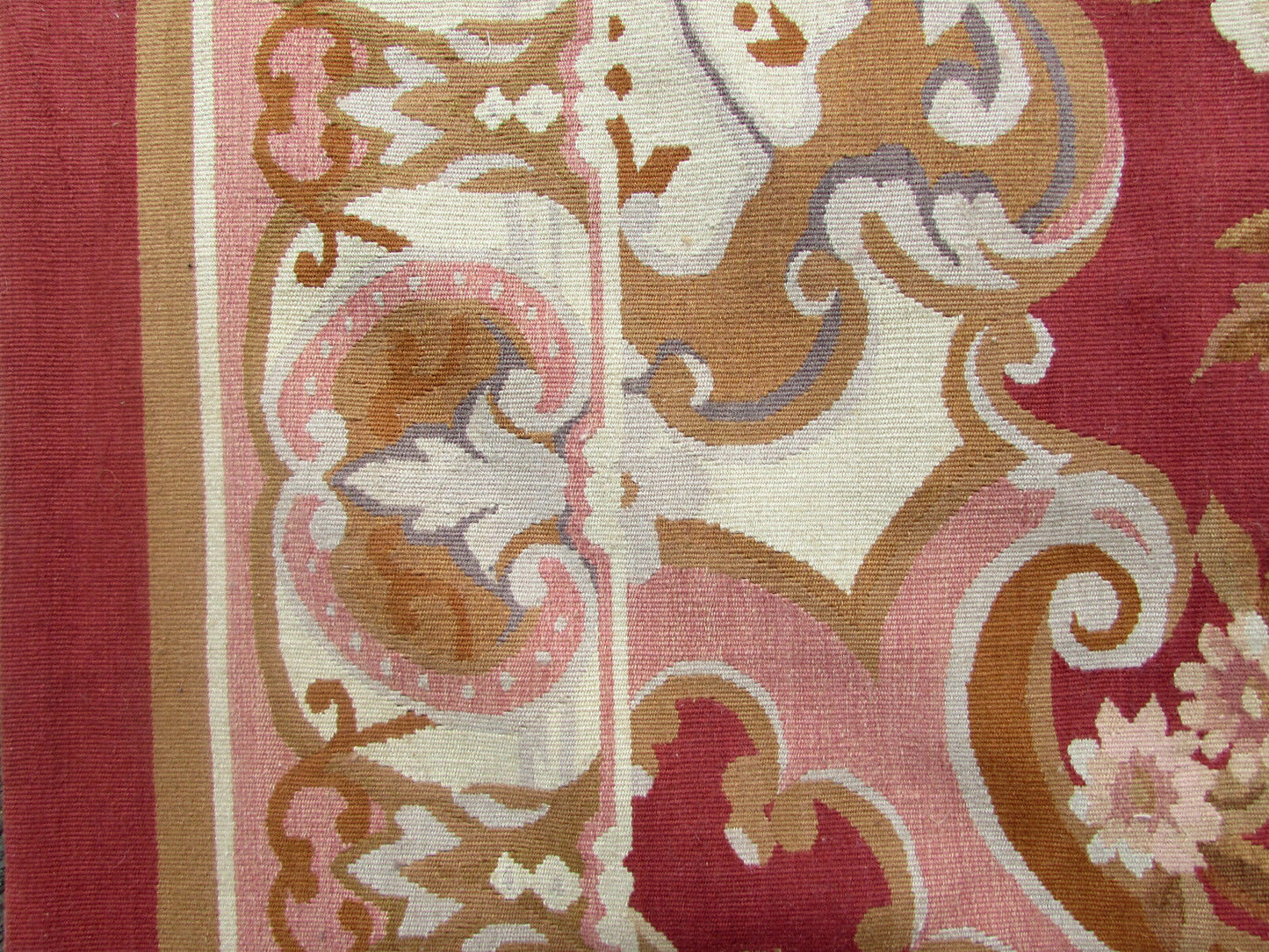 Fine craftsmanship and attention to detail showcased in a close-up of the Aubusson Rug's weaving technique